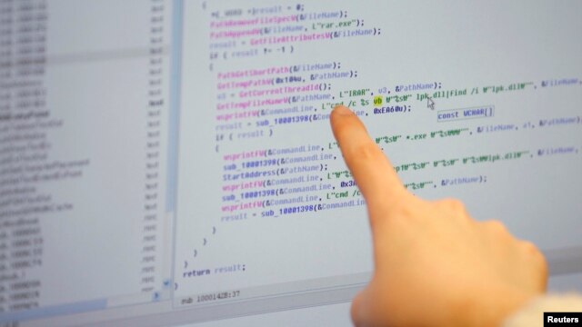 A researcher of Hauri, an IT security software company investigating computer viruses, works at a lab of the company in Seoul March 22, 2013.