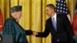President Barack Obama shakes hands with Afghan President Hamid Karzai in Washington, Jan. 11, 2013.