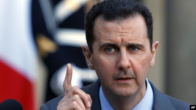 Tổng thống Syria Bashar al-Assad nói chuyện tại một cuộc họp báo