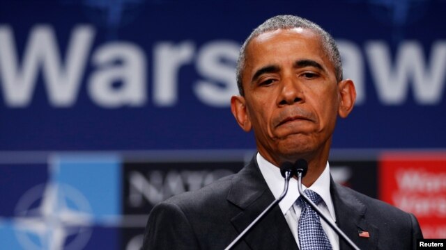President Barack Obama, speaking at a news conference after participating in a NATO summit in Warsaw, Poland, says that if Americans care about police officers' safety, they cannot pretend that the country's problems with gun violence are irrelevant, July 9, 2016.