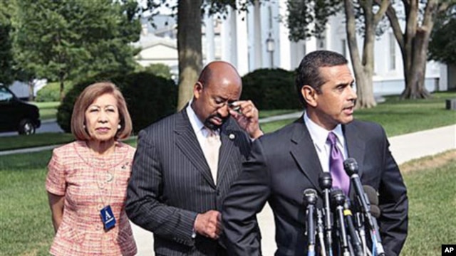 Mayors, from left to right, Elizabeth Kautz, Burnsville, Minnesota, Michael Nutter, Philadelphia, Pennsylvania, and Antonio Villaraigosa, Los Angeles, California, talk to the media following their meeting with President Barack Obama and Vice President Joe