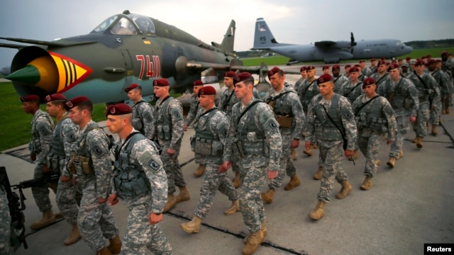 First company-sized contingent of about 150 U.S. paratroopers from the U.S. Army's 173rd Infantry Brigade Combat Team based in Italy march as they arrive to participate in training exercises with the Polish army in Swidwin, Poland, April 23, 2014.