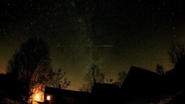 The view of the night sky from the Waldoboro Maine farmhouse where “The City Dark” filmmaker Ian Cheney grew up gazing at the stars (Courtesy Wicked Delicate Films)