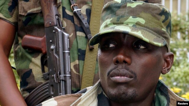FILE - General Sultani Makenga, military leader of the M23 rebels, addresses the media in Bunagana, in eastern Democratic Republic of Congo, September 8, 2013.