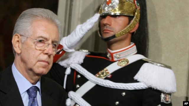 Italy's new premier-designate economist Mario Monti walks past a Cuirassier presidential guard at the Quirinale Presidential Palace in Rome after talks with Italian President Giorgio Napolitano, Sunday, Nov. 13, 2011.