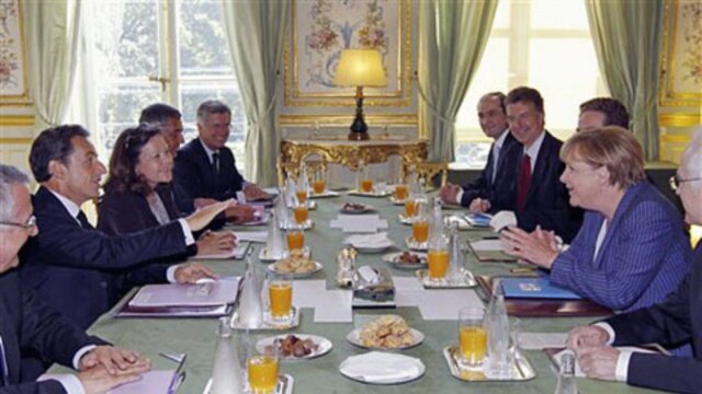 French and German leader attend a meeting Tuesday in Paris to discuss how to deal with Europe's debt crisis