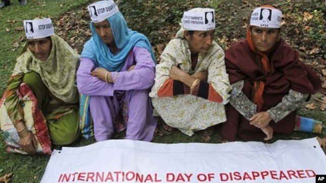 Relatives of missing Kashmiri youths participate in a protest organized by the Association of Parents of Disappeared Persons in Srinagar, India, August 29, 2011