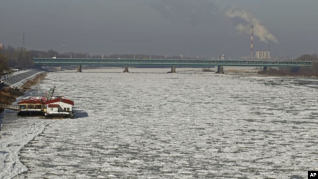The Vistula River is covered with ice floe near the old town of Warsaw,  Poland, January 31, 2012.