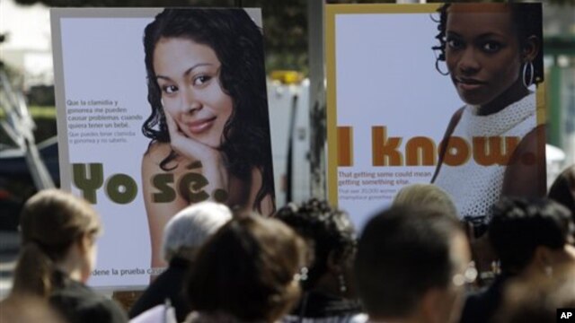 Public service posters in English and Spanish in 2011 for a program to provide young women in South Los Angeles with home-testing kits for sexually transmitted diseases. Los Angeles County had the highest number of chlamydia cases and the second-highest n