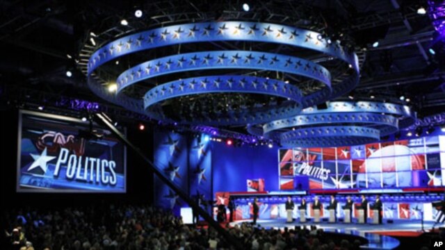 Republican presidential hopefuls at the beginning of the first New Hampshire debate of the 2012 campaign in Manchester, New Hampshire June 13, 2011