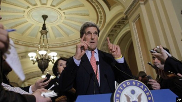 Sen. John Kerry, D-Mass., center, speaks as Sen. Dianne Feinstein, D-Calif., left, listens after an unusual closed Senate session in the Old Senate Chamber on Capitol Hill in Washington Monday, Dec. 20, 2010.