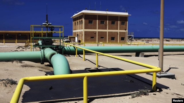 Pipelines run through the oil refinery at Zueitina near the northeastern Libyan town of Ajdabiyah, March 2011.