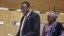 Ethiopian Prime Minister Hailemariam Desalegn (L) and Chairperson of the AU Commission Nkosazana Dlamini-Zuma leave the conference hall after the closing ceremony of the 20th Summit for the Africa Union in capital Addis Ababa, January 28, 2013.