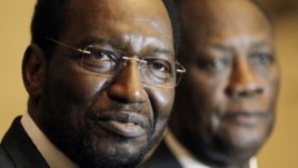 Mali's interim President Dioncounda Traore, left, with ECOWAS chairman, Ivory Coast President Alassane Ouattara, Abidjan, May 2012.