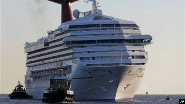 Carnival Triumph is towed into Mobile Bay Feb. 14, 2013