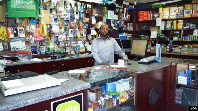 Abdikadir Hassan Mohammed has been a victim of several robberies in his Mayfair shop in Johannesburg. (VOA/S. Honorine)