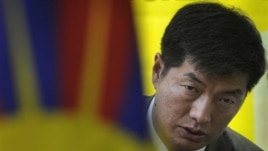 Newly elected head of the Tibetan government-in-exile Lobsang Sangay talks to the media after meeting with Tibetan activists on a hunger strike against blockade of the Kirti monastery in Sichuan province by Chinese forces, in New Delhi, India, Thursday, M
