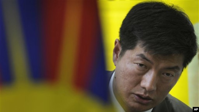 Newly elected head of the Tibetan government-in-exile Lobsang Sangay talks to the media after meeting with Tibetan activists on a hunger strike against blockade of the Kirti monastery in Sichuan province by Chinese forces, in New Delhi, India, Thursday, M