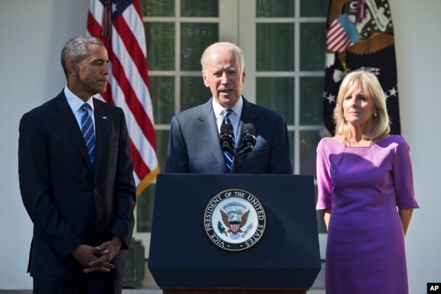 FILE - Vice President Joe Biden, accompanied by his wife Jill and President Barack Obama, announces that he will not run for the presidential nomination, Oct. 21, 2015, in the Rose Garden of the White House in Washington.