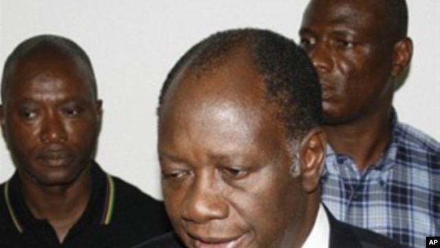 Ivory Coast opposition leader Alassane Ouattara addresses journalists after he was named by the country's electoral commission winner of the presidential election, 02 Dec 2010