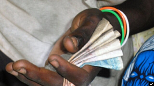 Cash is increasingly in short supply in Ivory Coast, adding to growing economic problems
