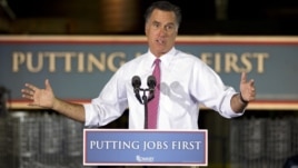 Republican presidential candidate, former Massachusetts Gov. Mitt Romney gestures during a campaign stop at Seilkop Industries in Cincinnati, Ohio, Thursday, June 14, 2012.