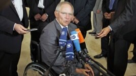 Germany's Finance Minister Wolfgang Schaeuble talks to the media before attending a eurozone finance ministers meeting in Luxembourg, June 21, 2012. 