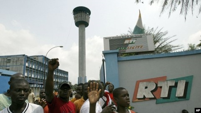 Protesters gather inside the national TV (RTI) headquarters in Abidjan, Ivory Coast (File Photo)