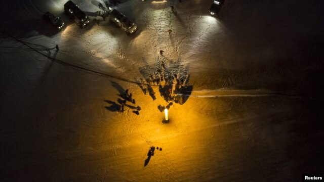 The Soyuz TMA-05M spacecraft shortly after it landed with the International Space Station crew of Japanese astronaut Akihiko Hoshide, Russian cosmonaut Yuri Malenchenko and U.S. astronaut Sunita Williams, near the town of Arkalyk in northern Kazakhstan, November 19, 2012. 