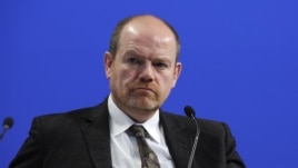 The incoming New York Times CEO, Mark Thompson, has been questioned about the BBC's handling of the scandal.