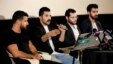 Lebanese Hamed Sinno, second left, lead singer and song writer of the Lebanese group Mashrou' Leila or "Leila's Project" band, speaks during a press conference with his band musicians, in Beirut, Lebanon, Thursday, April 28, 2016.