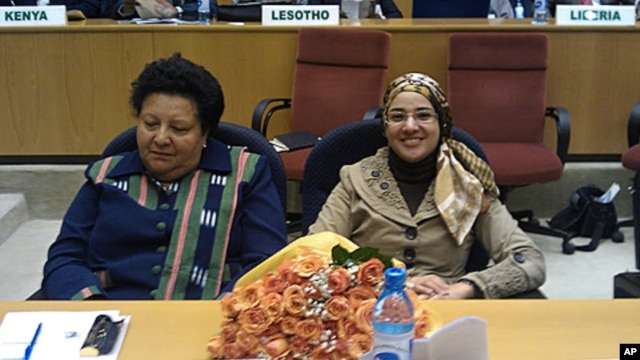 Prof. Dosso Mireille Carmen of Ivory Coast and Prof. Dr. Ebtehal El Demerdash of Egypt at AU headquarters to receive the Kwame Nkrumah Science Prize, December 14, 2011.