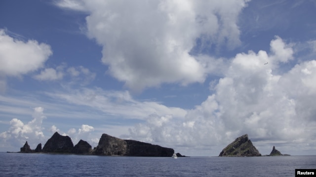 A group of disputed islands known as Senkaku in Japan and Diaoyu in China is seen from the city government of Tokyo's survey vessel in the East China Sea, September 2, 2012.
