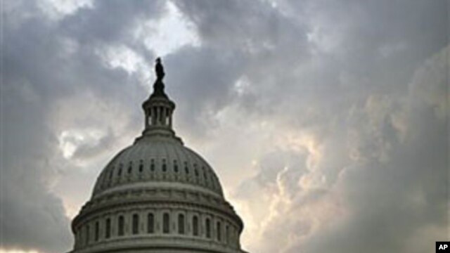 Credit rating agency Standard & Poor's says it has downgraded the United States' credit rating for the first time in the history of the ratings because the deficit-reduction plan doesn't do enough to stabilize debt, and this photo shows the US Capitol jus
