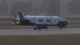 A June 16, 2012 image from video made available by Vandenberg Air Force Base shows the X-37B unmanned spacecraft landing at Vandenberg Air Force Base, California. 