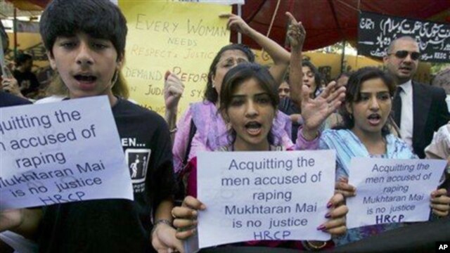 Members of a Pakistani civil society hold a protest against a supreme court decision regarding the 2002 rape case of Mukhtar Mai,  April 23, 2011, in Karachi, Pakistan.