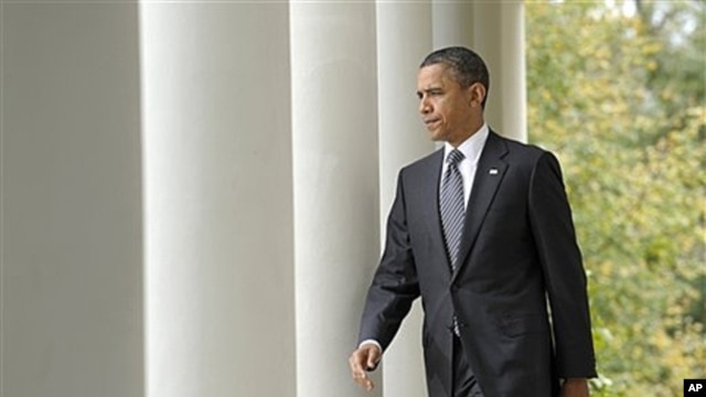 President Obama walks to the Rose Garden of the White House to discuss the death of former Libyan leader Moammar Gadhafi, Oct. 20, 2011.