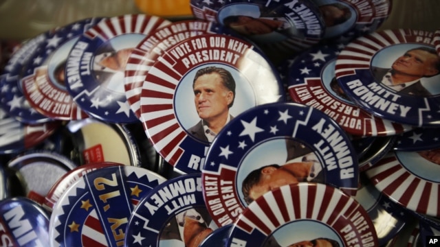 Republican presidential candidate and former Massachusetts Gov. Mitt Romney campaign buttons are displayed ahead of the Republican National Convention in Tampa, Fla., on Aug. 26, 2012. 