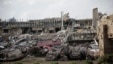Flipped vehicles are piled up outside the heavily damaged Moore Medical Center after a powerful tornado ripped through the area on May 20, 2013 in Moore, Oklahoma.