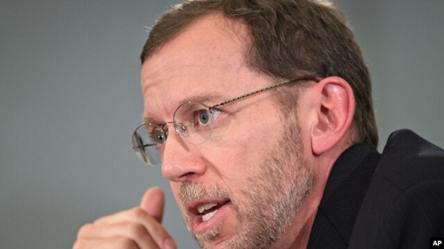 FILE - Congressional Budget Office Director Doug Elmendorf testifies before a House Budget Committee hearing in Washington