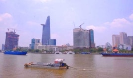 A view over the Saigon river next to Ho Chi Minh city’s financial district … An expert in illegal wildlife trafficking says many of the people involved in the illicit trade in rhino horn are from this and other Vietnamese cities.