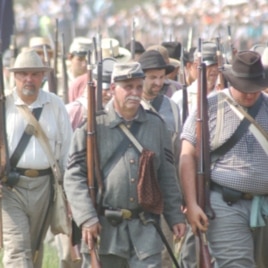 These re-enactors are portraying Confederate soldiers from the old American South.