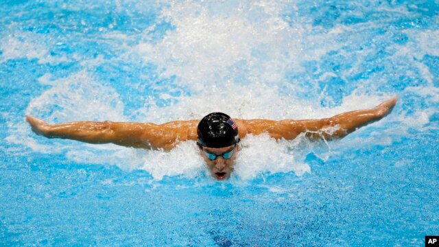 FILE -  United States' Michael Phelps swims in the men's 4 X 100-meter medley relay at the Aquatics Center in the Olympic Park during the 2012 Summer Olympics in London.