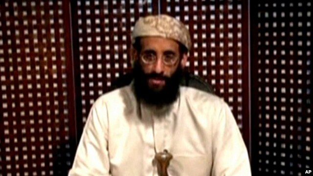 Anwar al Awlaki, a US-born cleric linked to al-Qaida's Yemen-based wing, gives a religious lecture in an unknown location in this still image taken from video released by Intelwire.com on September 30, 2011.