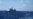 FILE - Chinese ships chase Vietnamese vessels, not shown, after they came within 10 nautical miles of a Chinese oil rig in the South China Sea, July 15, 2014. 