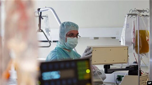 Doctor Hauke Weilert checks the kidney dialysis of an E. coli patient at Asklepios Hospital in Hamburg-Altona, Germany, June 6, 2011