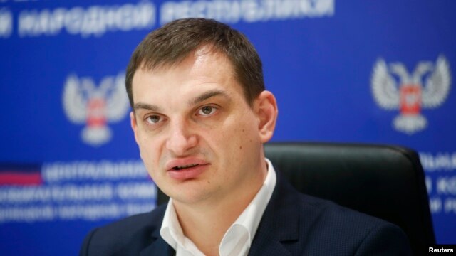 Глава избирательной комиссии самопровозглашенной Донецкой народной республики Роман Лягин на пресс-конференции в Донецке 28 октября 2014 г.