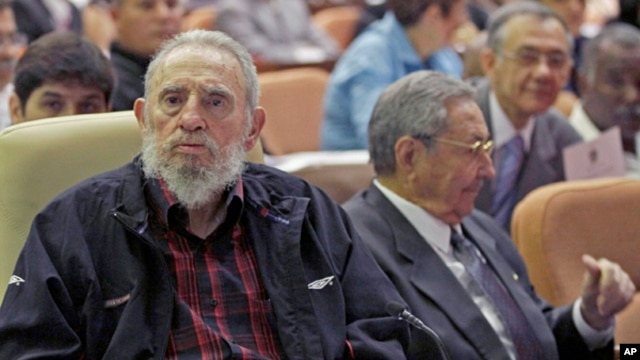 Cuba's leader Fidel Castro (l) and his brother President Raul Castro attend the opening session of the National Assembly in Havana,  Feb. 24, 2012.  