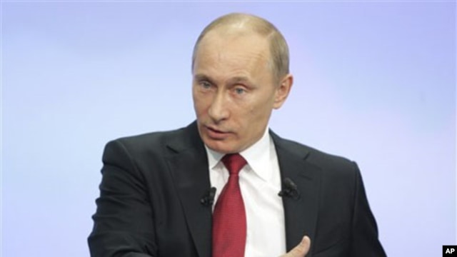 Russia's Prime Minister Vladimir Putin during a call-in session broadcast live on Russian state television and radio in Moscow, 16 Dec 2010