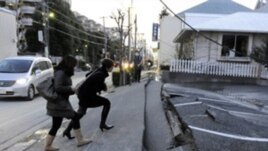 Japan's massive 8.9-magnitude earthquake collapsed a pedestrian road in Urayasu city, Chiba prefecture, Japan, March 11, 2011.